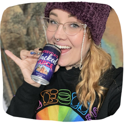 Energy drink female face on can, college-aged student own drink.